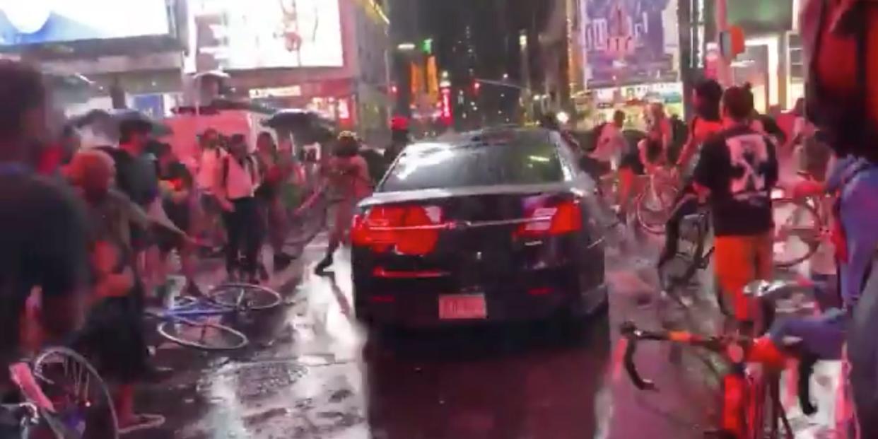 car plows through protesters in times square