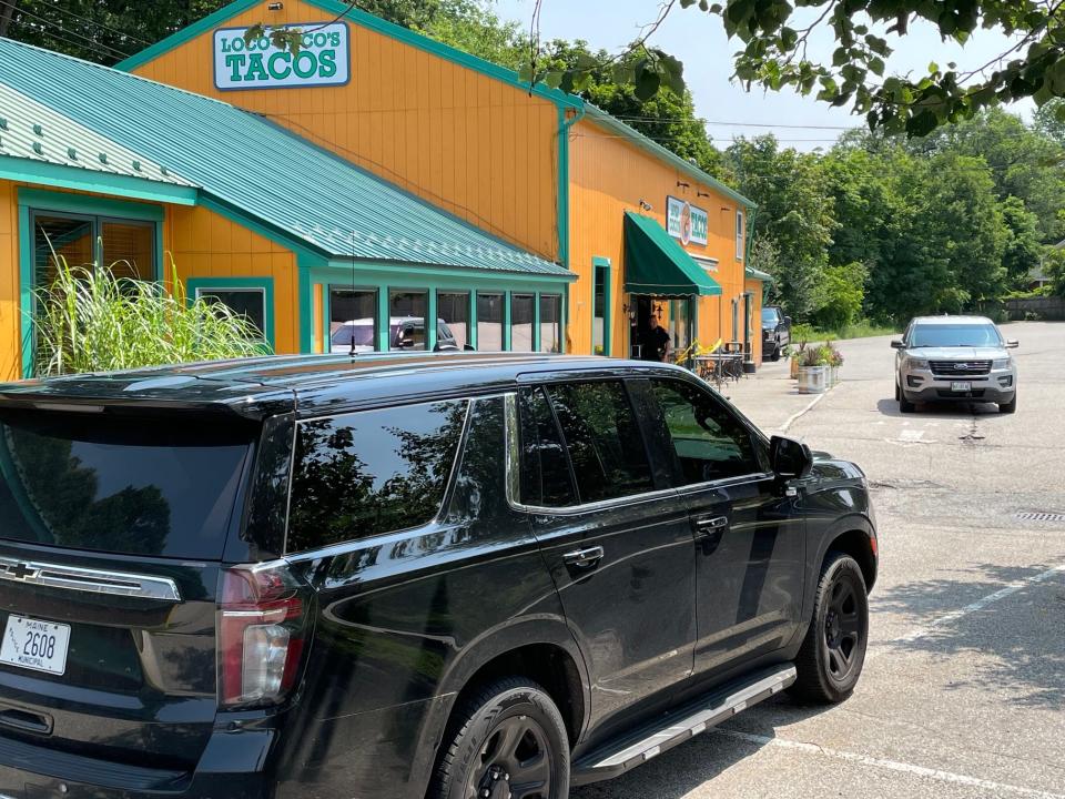 Police respond to investigate at Loco Coco's Tacos in Kittery, Maine, Monday, July 17, 2023. A man died after falling at the restaurant, according to police.