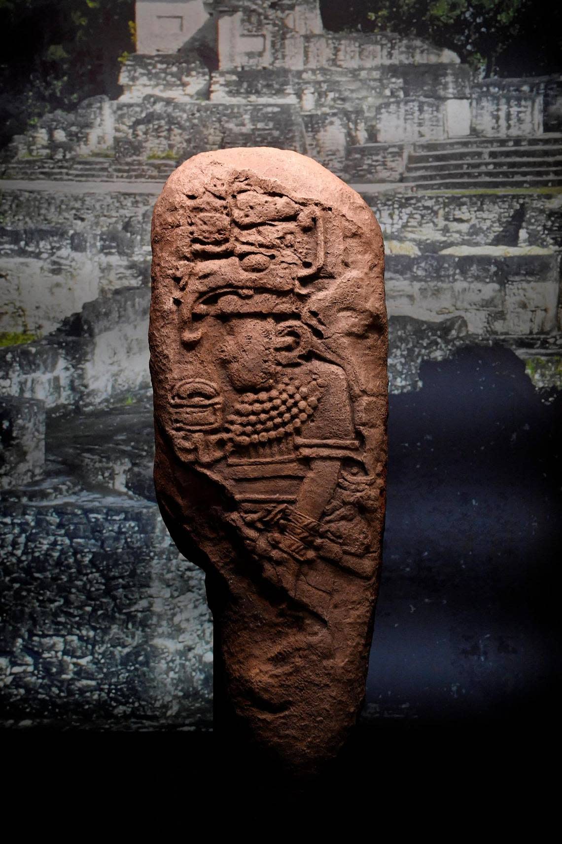 This stela was found at an archaeological site south of Tikal, Guatemala. It bears a dedication date which corresponds to Dec. 10, 435. The individual, possibly the ruler of El Zapote, holds a hieroglyph in his hand.
