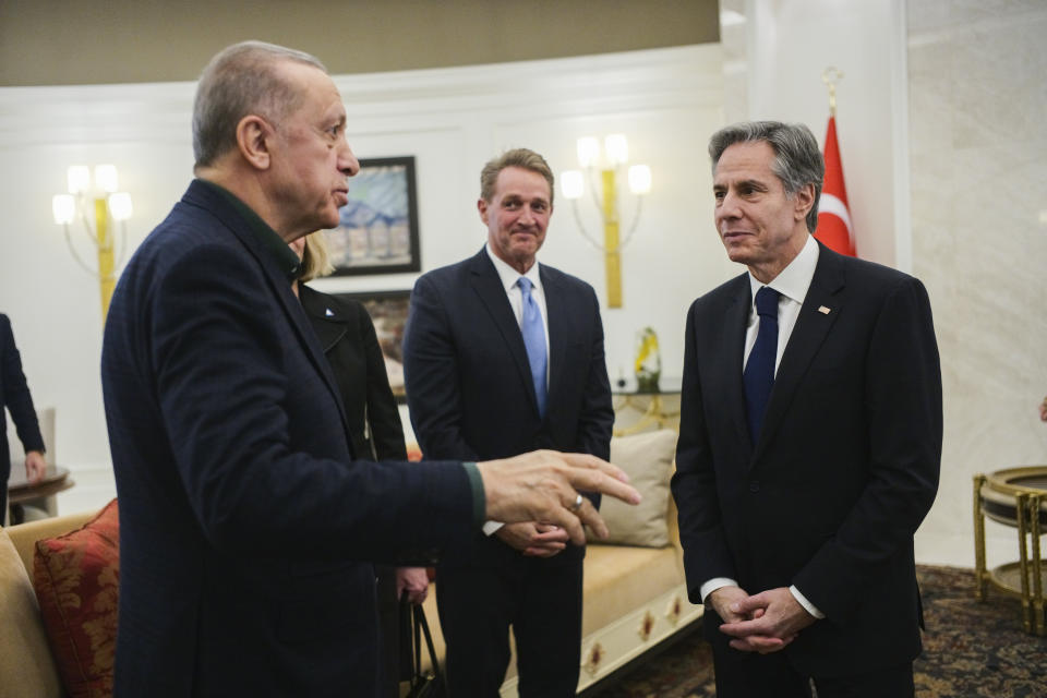 Turkish President Recep Tayyip Erdogan, left, talks to U.S. Secretary of State Antony Blinken during their meeting at Esenboga airport in Ankara, Turkey, Monday, Feb. 20, 2023. (AP Photo/Burhan Ozbilici, Pool)