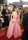 The “New Girl” star, Zooey Deschanel, stayed true to her vintage style, sporting a full-skirted, bubblegum pink Emmy gown by Monique Lhuillier on the 2011 Emmy red carpet, but the look received mixed reviews.