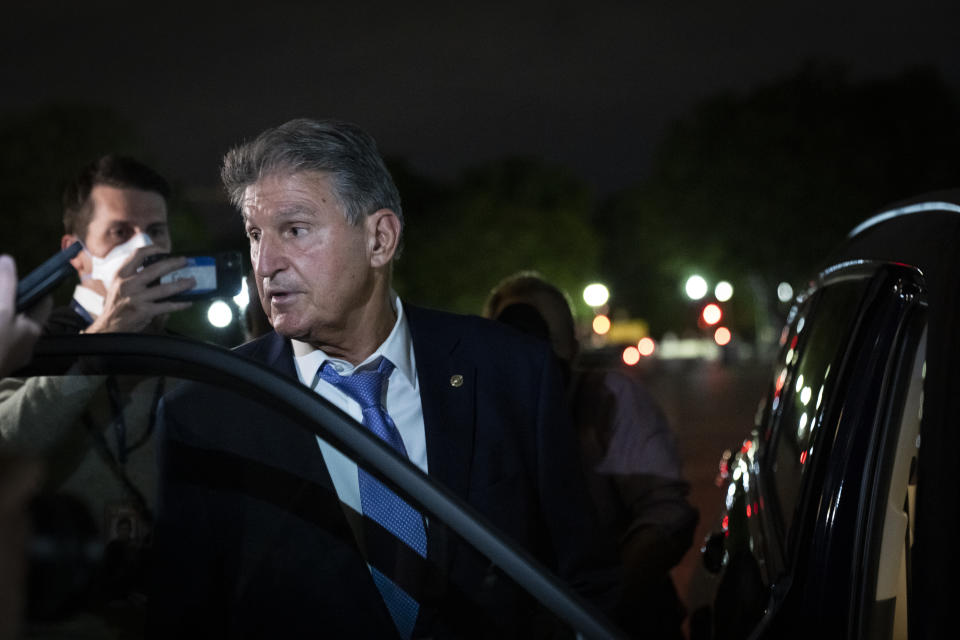 WASHINGTON, DC - SEPTEMBER 30: Sen. Joe Manchin (D-WV) exits the U.S. Capitol after meeting with White House officials September 30, 2021 in Washington, DC. Manchin has stated that he will not support a social policy spending package that goes over $1.5 trillion, at odds with the $3.5 trillion package supported by more liberal Democrats. (Photo by Drew Angerer/Getty Images)