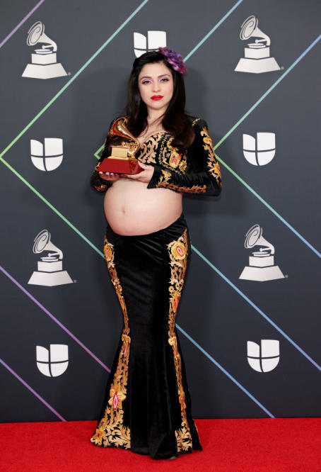 Pregnant singer Mon Laferte displays baby bump in very unusual outfit at  Latin Grammys