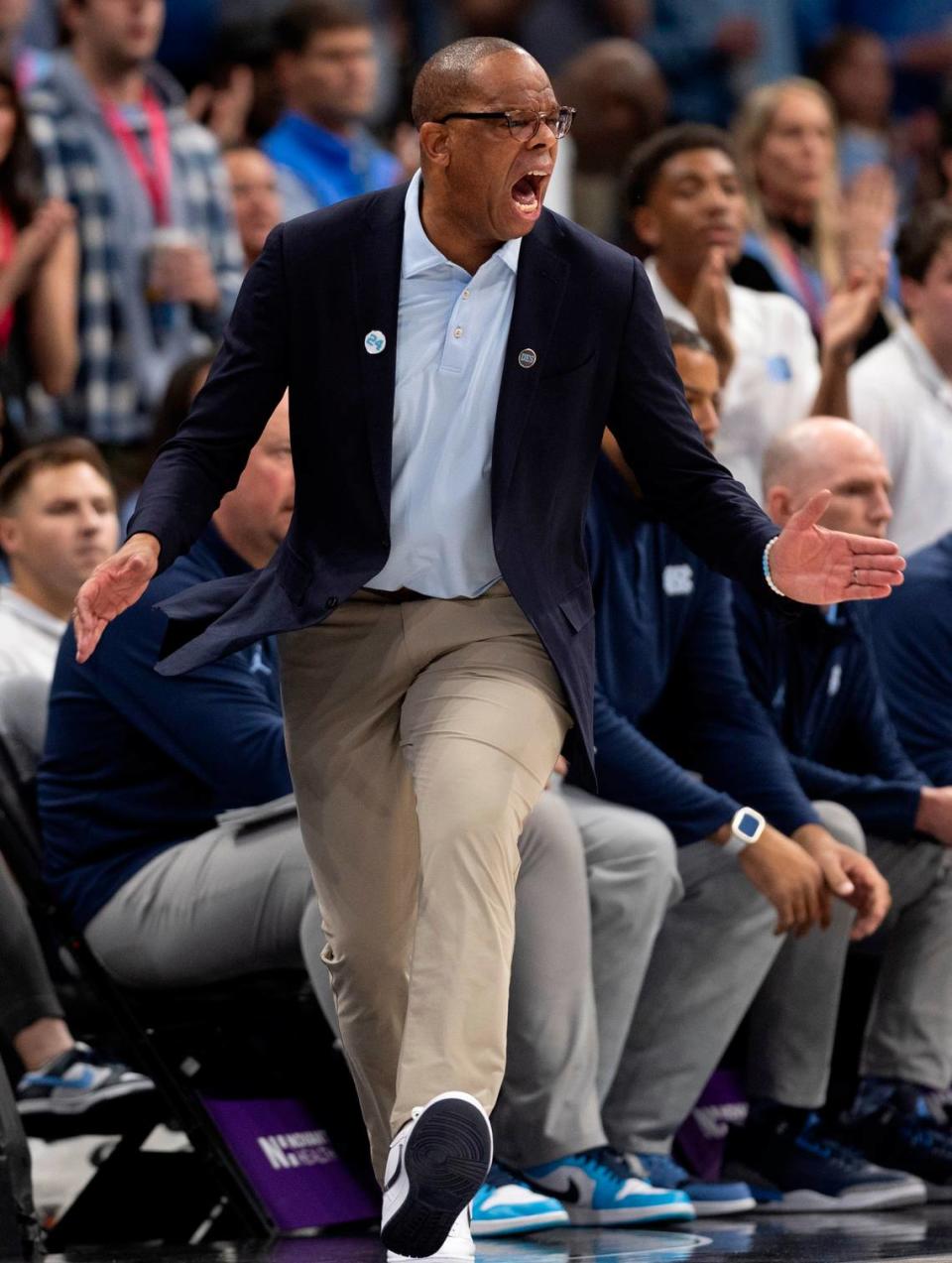 North Carolina coach Hubert Davis directs his team on defense in the first half against Oklahoma on Wednesday, December 20, 2023 at the Spectrum Center in Charlotte, N.C.