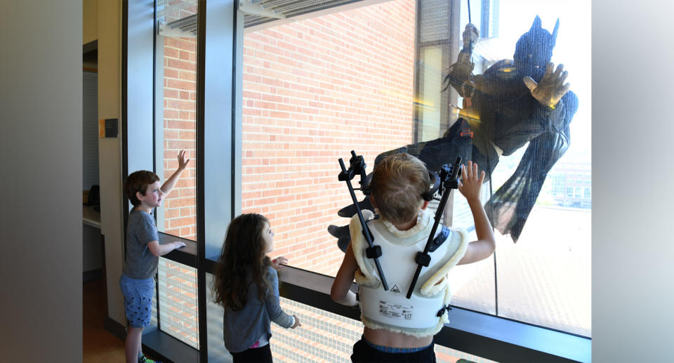 A local S.W.A.T. officer dressed as Batman (pictured)