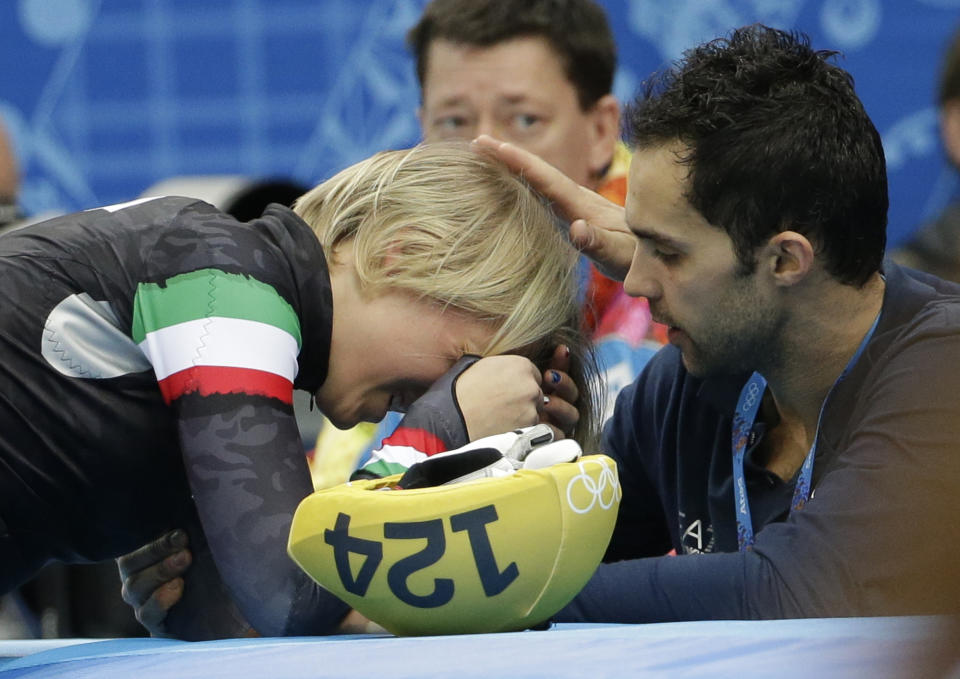 Arianna Fontana of Italy reacts after competing in a women's 500m short track speedskating final at the Iceberg Skating Palace during the 2014 Winter Olympics, Thursday, Feb. 13, 2014, in Sochi, Russia. (AP Photo/David Goldman)