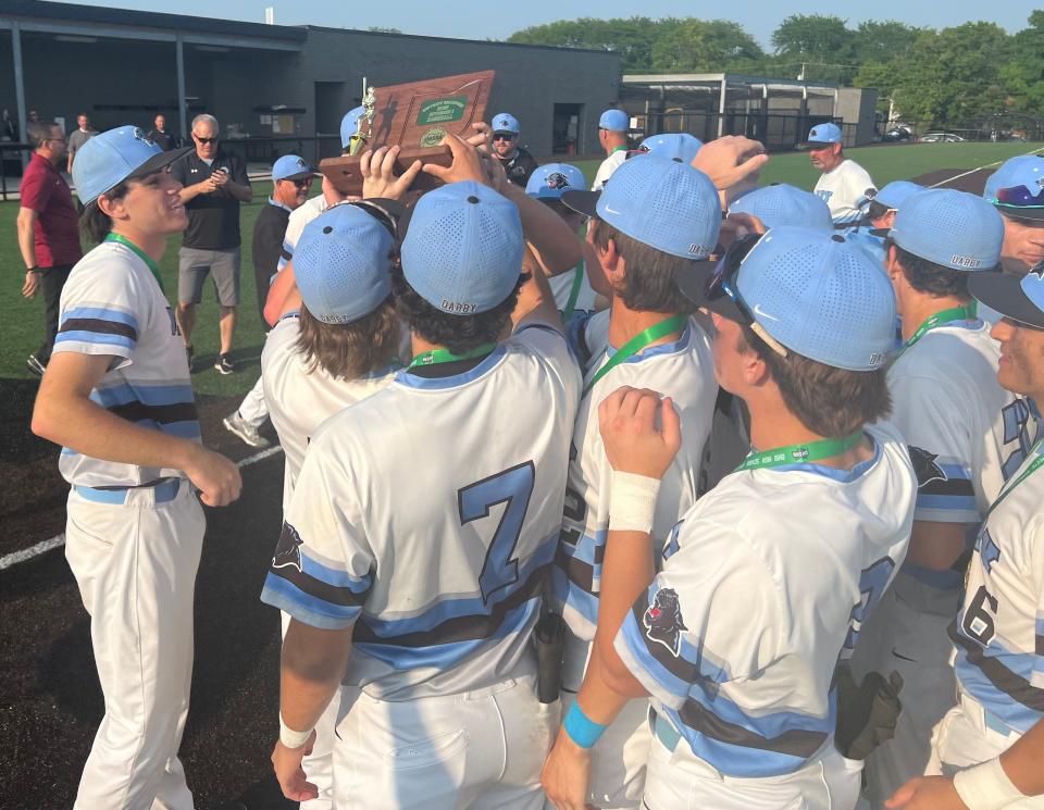 Hilliard Darby celebrates after beating Gahanna 11-1 in five innings in a Division I district final Wednesday at Upper Arlington.