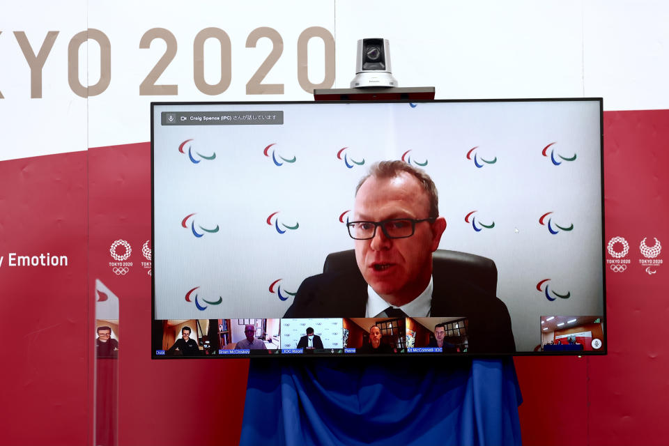 Chief brand and communications officer of IOC Craig Spence speaks during an online press briefing for the presentation of the version three of Tokyo 2020 Playbook in Tokyo, Tuesday, June 15, 2021. (Behrouz Mehri/Pool Photo via AP)