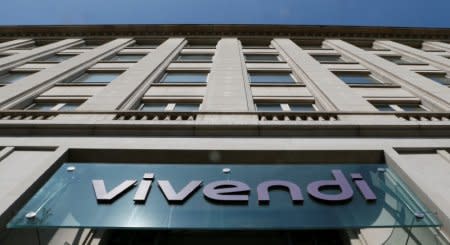 FILE PHOTO: A logo is seen over the main entrance of the entertainment-to-telecoms conglomerate Vivendi's headquarters in Paris April 8, 2015.    REUTERS/Gonzalo Fuentes/File Photo