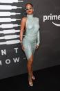 <p>In a silver, asymmetrical Alexandre Vauthier dress, matching futuristic sunglasses, oversized hoop earrings, a watch, and strappy, flower-accented sandals at the Savage X Fenty show in Brooklyn, NY.</p>