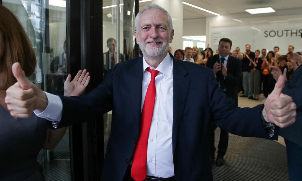 Jeremy Corbyn gives a thumbs-up as he arrives at Labou HQ on the day after the election.