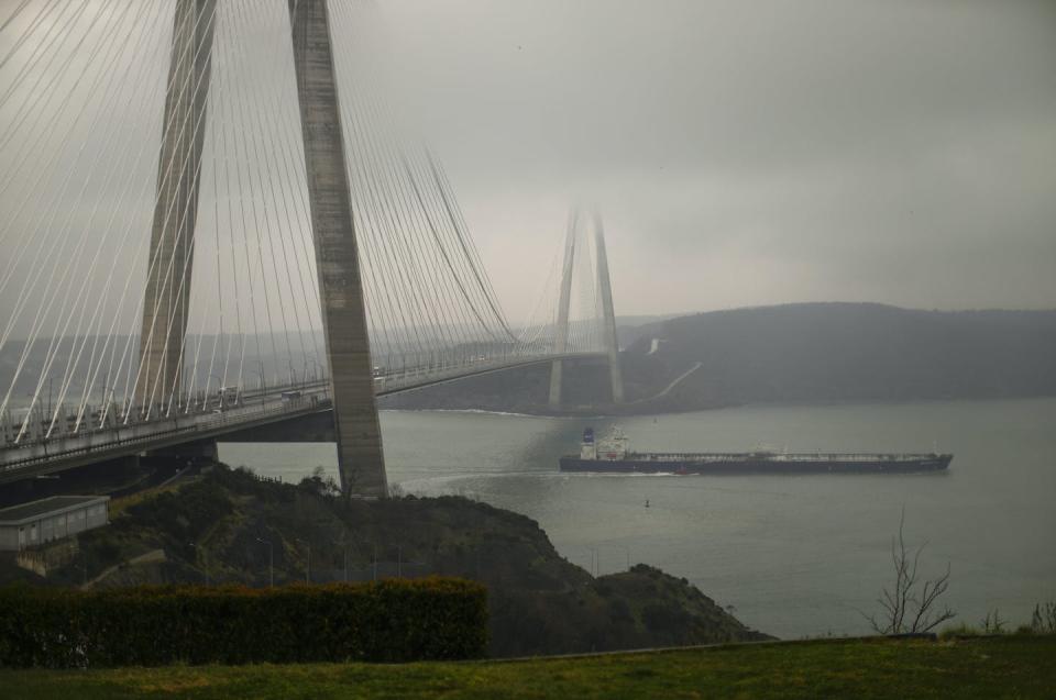 A Russian oil tanker sails under Yavuz Sultan Selim bridge in Istanbul in March 2022 after departing from Russia’s Novorossiysk port. (AP Photo/Francisco Seco)