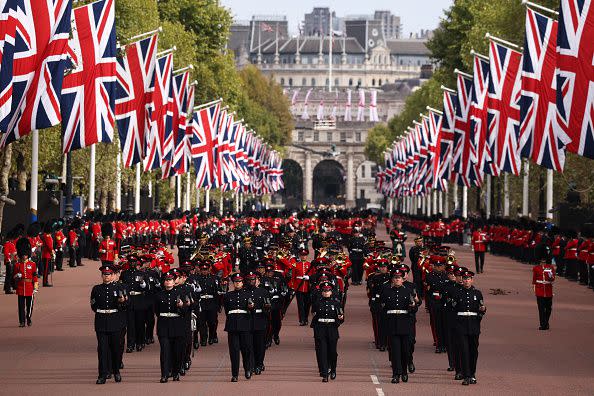 LONDON, ENGLAND - SEPTEMBER 19: The Queen's funeral cortege borne on the State Gun Carriage of the Royal Navy travels along The Mall on September 19, 2022 in London, England. Elizabeth Alexandra Mary Windsor was born in Bruton Street, Mayfair, London on 21 April 1926. She married Prince Philip in 1947 and ascended the throne of the United Kingdom and Commonwealth on 6 February 1952 after the death of her Father, King George VI. Queen Elizabeth II died at Balmoral Castle in Scotland on September 8, 2022, and is succeeded by her eldest son, King Charles III.  (Photo by Dan Kitwood/Getty Images)