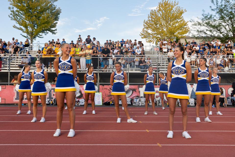 Orem’s cheer team leads the student section at their high school football season opener against East at East High School in Salt Lake City on Friday, Aug. 11, 2023. | Megan Nielsen, Deseret News