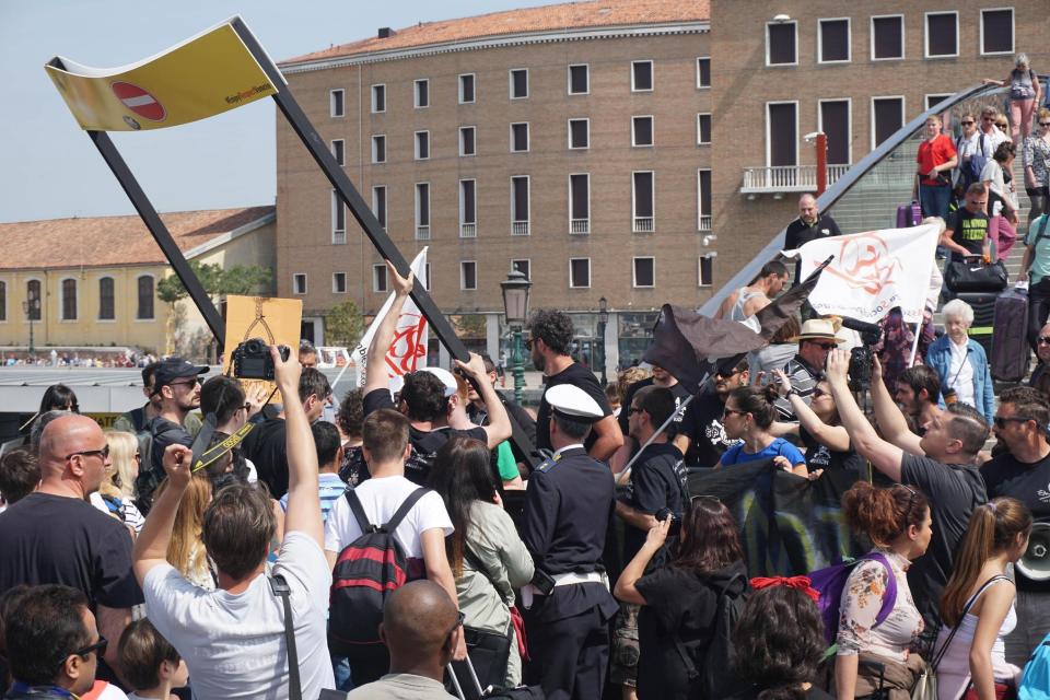 Demonstrators protest against metal turnstiles in Venice on April 29. Source: AAP