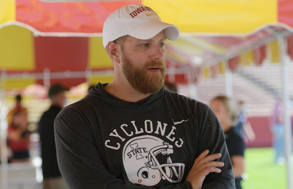 Iowa State offensive coordinator Tom Manning talks to the media during the university football media day in 2021.