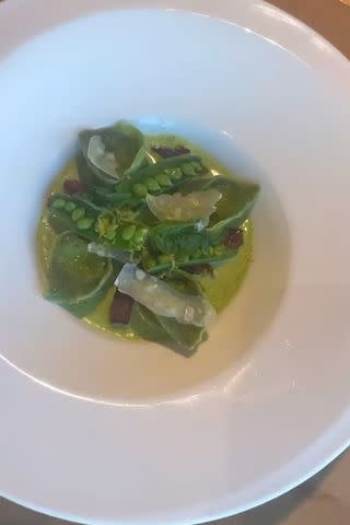 <p>giadadelaurentiis/Instagram</p> A stuffed pasta dish with snap peas and shave parmigiano reggiano