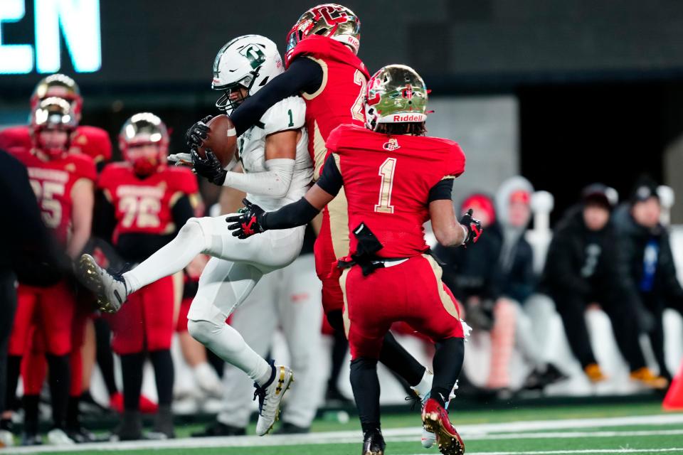 Jordan Thomas, of Bergen Catholic, was able to make sure Philip Folmar, of Delbarton, did not catch this pass, Tuesday, November 28, 2023.