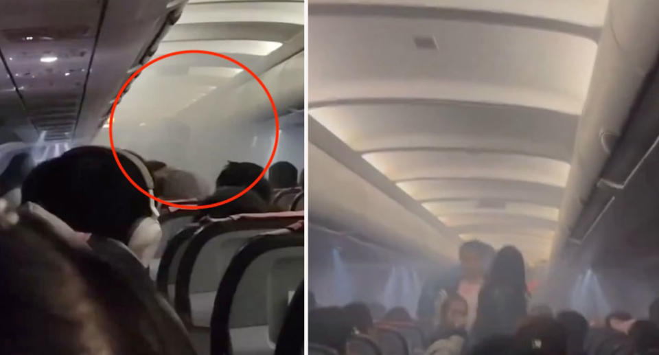 Smoke fills plane cabin as passengers attempt to escape it. 