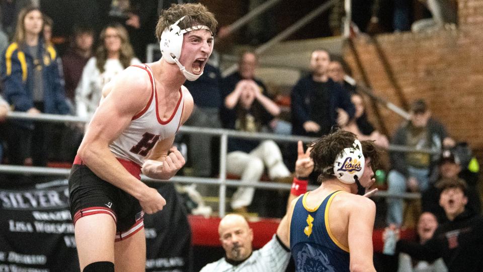 Haddonfield’s Alex Goldman celebrates after defeating Gloucester's Jason Chiodi, 2-0 in triple overtime, during the 157 lb. bout of the wresting meet held at Haddonfield Memorial High School on Friday, January 6, 2023.  