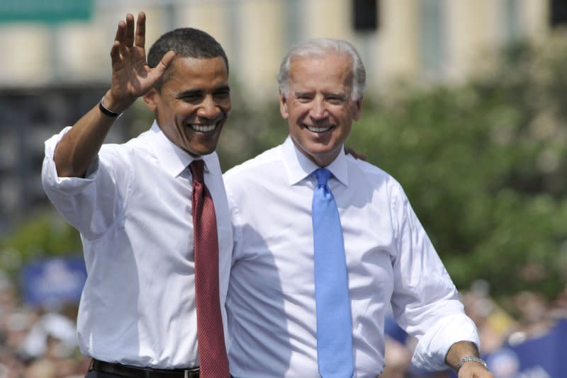 Then-Democratic presidential candidate Sen. Barack Obama, D-Ill., (L) and then-Sen. Joe Biden, D-Del., greet the crowd during a rally at which Obama announced Biden as his running mate at the Old State Capitol in Springfield, Ill., on August 23, 2008. File Photo by Darrell Hoemann/UPI