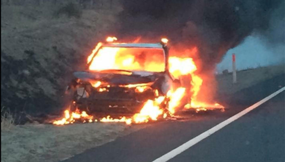 Three men are lucky to be alive after their car hit a kangaroo and burst into flames along a NSW motorway. Source: Michelago Rural Fire Brigade