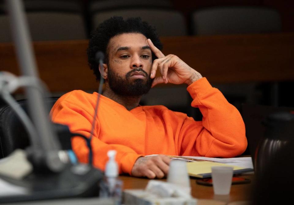 Murder suspect Mtula Payton, 29, listens to a witness in Sacramento Superior Court on Friday during a preliminary hearing in the case of the April 2022 mass shooting in downtown Sacramento.

