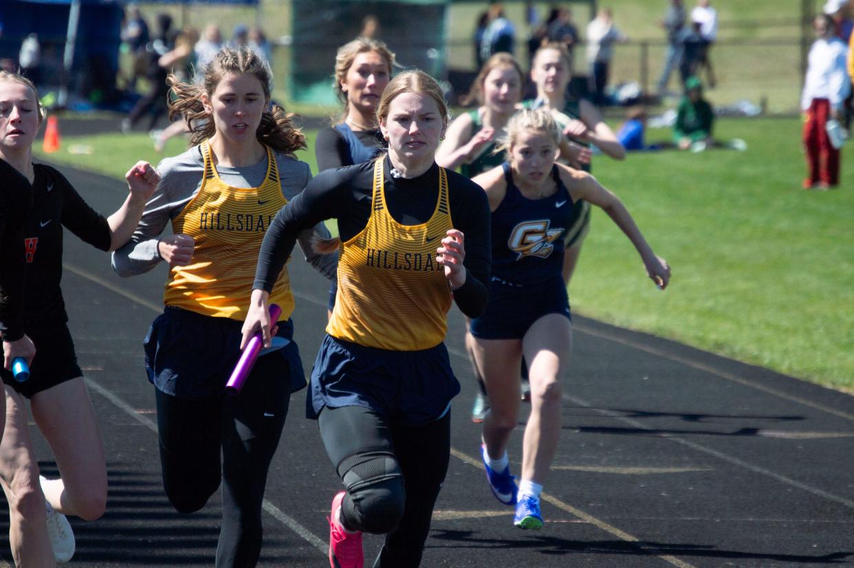 Hillsdale's 4x100 relay team (pictured here is Annemarie Moore and Amelia Dietz) are No. 1 in the first Area Best rankings of the season.