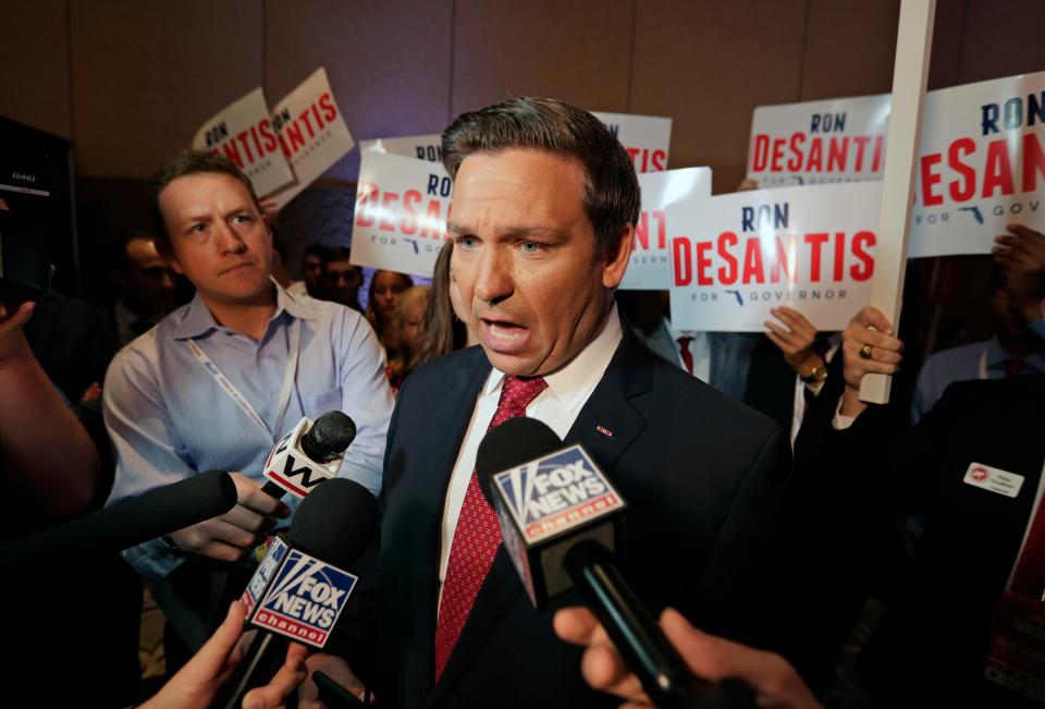 U.S. Rep. Ron DeSantis speaks to reporters June 28, 2018, after a Florida Republican gubernatorial primary debate at the Republican Sunshine Summit in Kissimmee. The Florida GOP is holding another Sunshine Summit this year in Hollywood, but has not responded to requests by the media for credentials to cover the event.