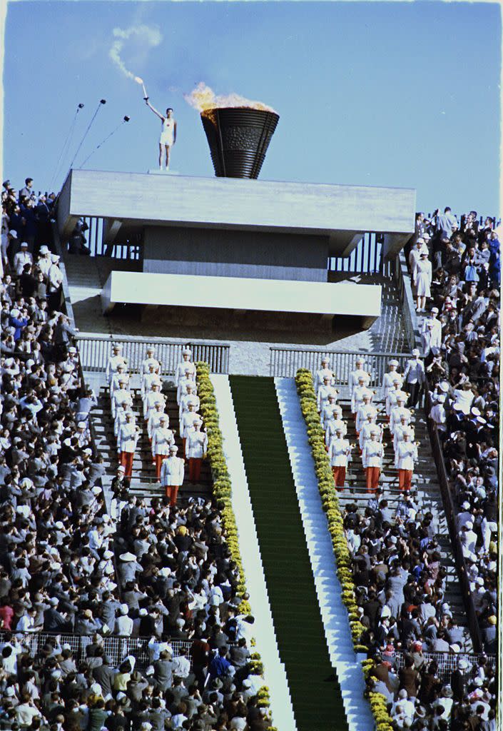 <p>Yoshinori Sakai, who was born in Hiroshima on the exact date that the atomic bomb was dropped, had the honor of lighting the cauldron. </p>