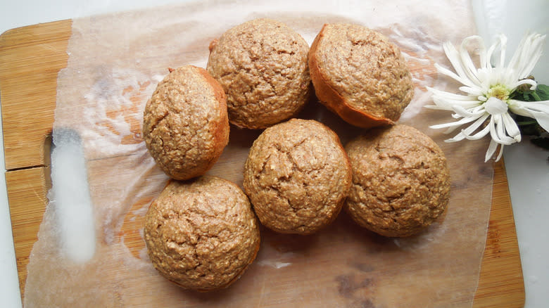 Bran muffins on cutting board