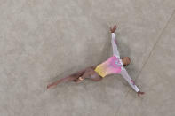 Rebeca Andrade, of Brazil, performs in the floor exercise during the artistic gymnastics women's apparatus final at the 2020 Summer Olympics, Monday, Aug. 2, 2021, in Tokyo, Japan. (AP Photo/Jeff Roberson)