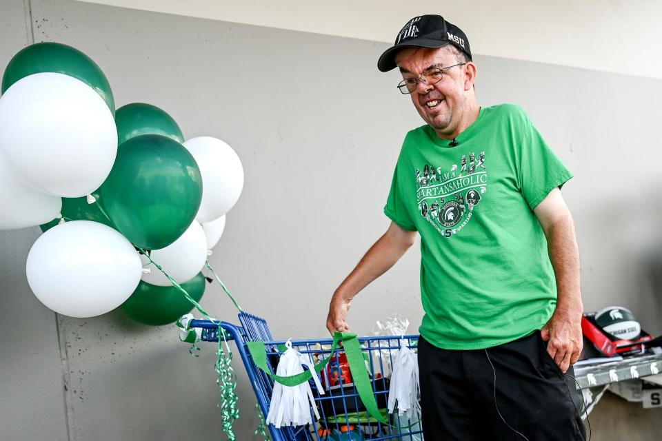 Dave Esch smiles during a celebration for him on Wednesday, July 20, 2022, at the Meijer in Grand Ledge. Esch was honored for returning his millionth shopping cart as an employee of the store.