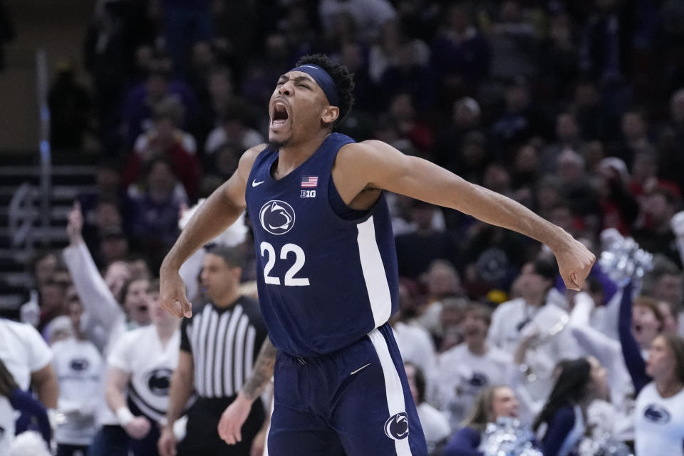 Penn State's Jalen Pickett celebrates after scoring on a three-point basket during overtime of an NCAA college basketball game against the Northwestern at the Big Ten men's tournament, Friday, March 10, 2023, in Chicago. Penn State won 67-65. (AP Photo/Charles Rex Arbogast)