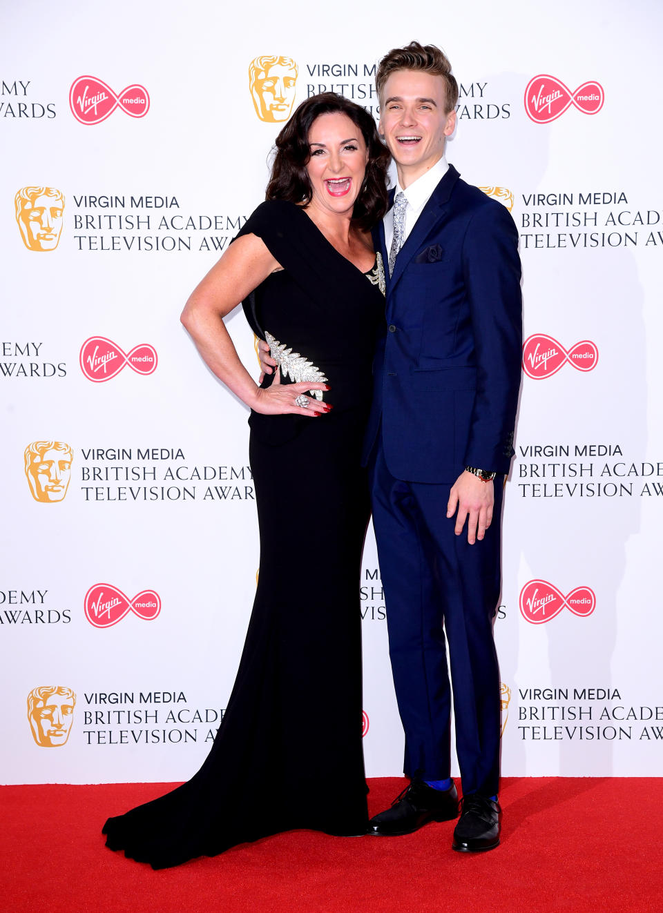 Shirley Ballas and Joe Sugg in the press room at the Virgin Media BAFTA TV awards, held at the Royal Festival Hall in London.