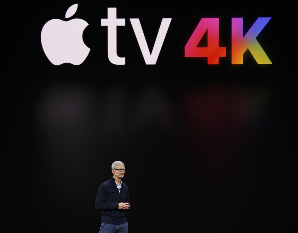 Apple’s Tim Cook speaks during a product launch event in Cupertino