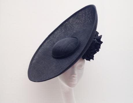 <p>A hat or headpiece must be worn at all times. In the Royal Enclosure they also have to have a diameter wider than four inches. You can hire or buy suitable hats from numerous shops and online stores. <i><a rel="nofollow noopener" href="http://www.lizzieshats.com/collections/1/520" target="_blank" data-ylk="slk:[Lizzie’s Hats];elm:context_link;itc:0;sec:content-canvas" class="link ">[Lizzie’s Hats]</a></i></p>