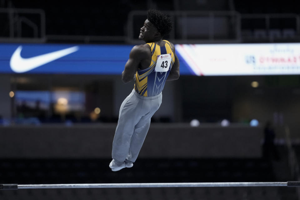 FILE - Fred Richard competes on the horizontal bar during the U.S. gymnastics championships Thursday, Aug. 24, 2023, in San Jose, Calif. Richard is part of a U.S. men's national team trying to return to relevance. The Americans haven't won a medal at a major international competition in nearly a decade. (AP Photo/Godofredo A. Vásquez, File)