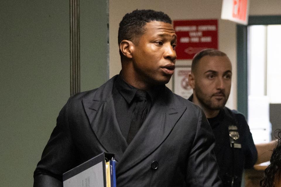 Actor Jonathan Majors arrives at court for a trial on his domestic violence case on Dec. 4 in New York.