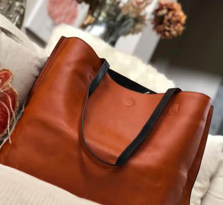 A reversible vegan-leather travel tote if you'd rather travel with a shoulder bag