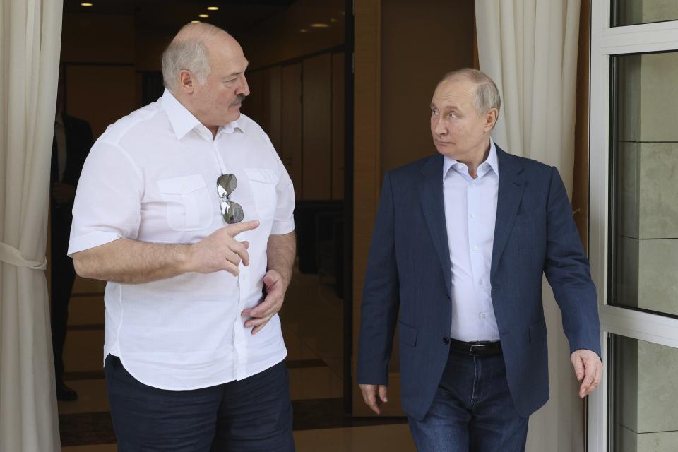 FILE - Russian President Vladimir Putin, left, and Belarusian President Alexander Lukashenko speak during their meeting at the Bocharov Ruchei residence in the resort city of Sochi, Russia, Friday, June 9, 2023. Mercenary chief Yevgeny Prigozhin said his troops got as close as 200 kilometers (about 125 miles) from Moscow when he ordered them to turn back under a deal brokered by Belarusian President Lukashenko that granted amnesty to him and of his Wagner Group of private contractors, allowing them to move to Belarus. (Gavriil Grigorov, Sputnik, Kremlin Pool Photo via AP, File)