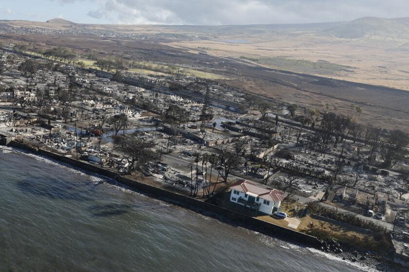 Kihei, Maui, Thursday, August 10, 2023 - A single house on Front St. looks unscathed by the devastating wildfire that swept through Lahaina. The owner, who lives on the mainland, said they restored the house to be more historically accurate and believes their termite protection helped fend off flames. (Robert Gauthier/Los Angeles Times)