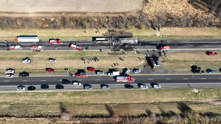 Both directions of Interstate 70 are closed in Licking County, Ohio, near the State Route 310 interchange after a fatal accident on Tuesday, Nov. 14, 2023. A charter bus carrying students from a high school was rear-ended by a semi-truck on the Ohio highway. (Barbara Perenic /The Columbus Dispatch via AP)