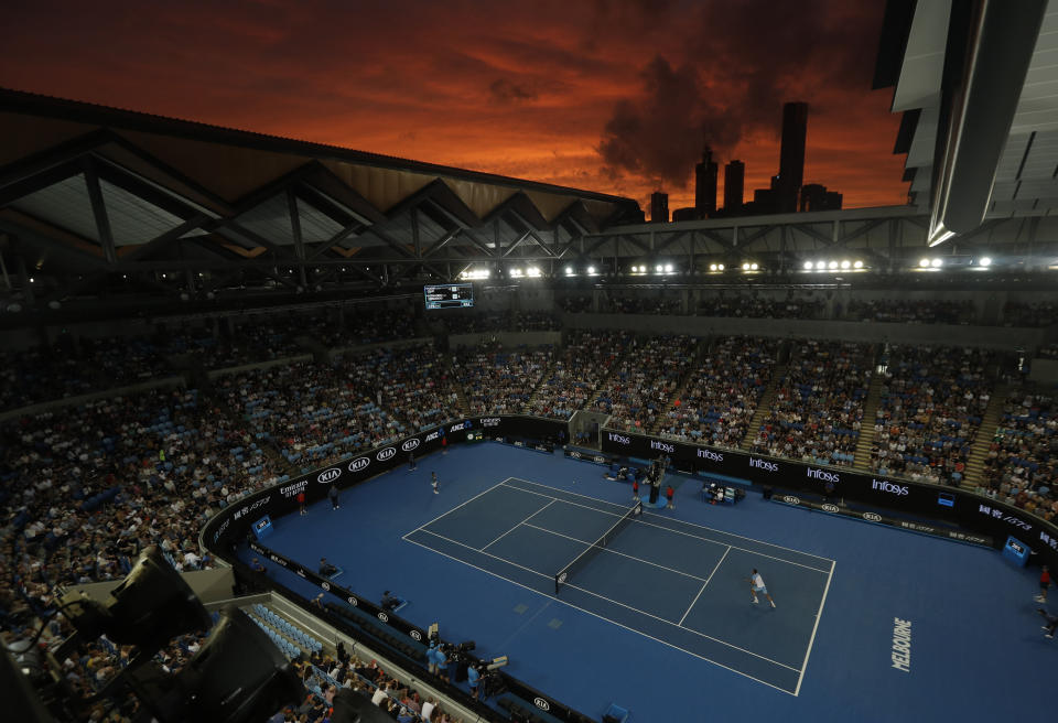 <p>The sun sets over the Melbourne skyline as Croatia’s Marin Cilic and Spain’s Fernando Verdasco play their third round match at the Australian Open tennis championships in Melbourne, Australia, Friday, Jan. 18, 2019. (AP Photo/Mark Schiefelbein) </p>