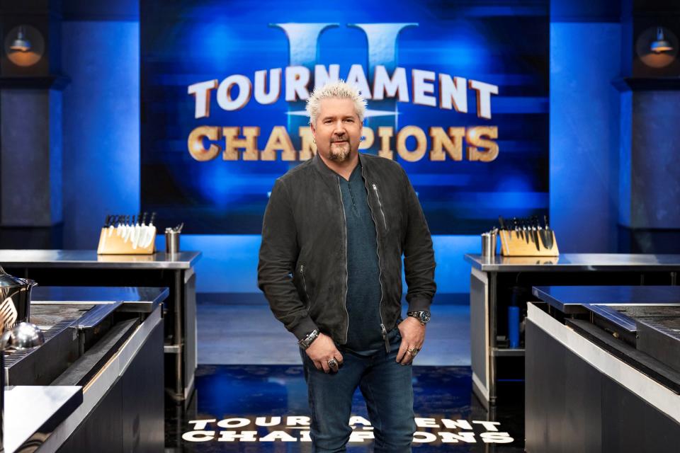 Guy Fieri and his classic frosted tips are back to host "Tournament of Champions II," airing Sundays on Food Network.
