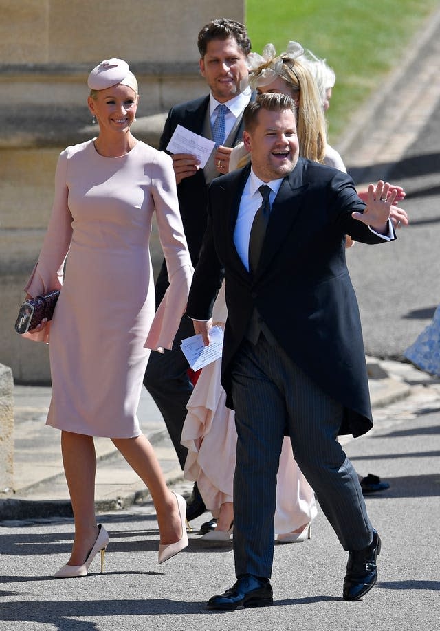 Julia Carey and James Corden arrive for the wedding of the Duke and Duchess of Sussex 