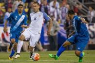 United States forward Clint Dempsey (8) dribbles the ball while Guatemala defender Carlos Castrillo (13) defends in the first half of the game during the semifinal round of the 2018 FIFA World Cup qualifying soccer tournament at MAPFRE Stadium. Trevor Ruszkowski-USA TODAY Sports