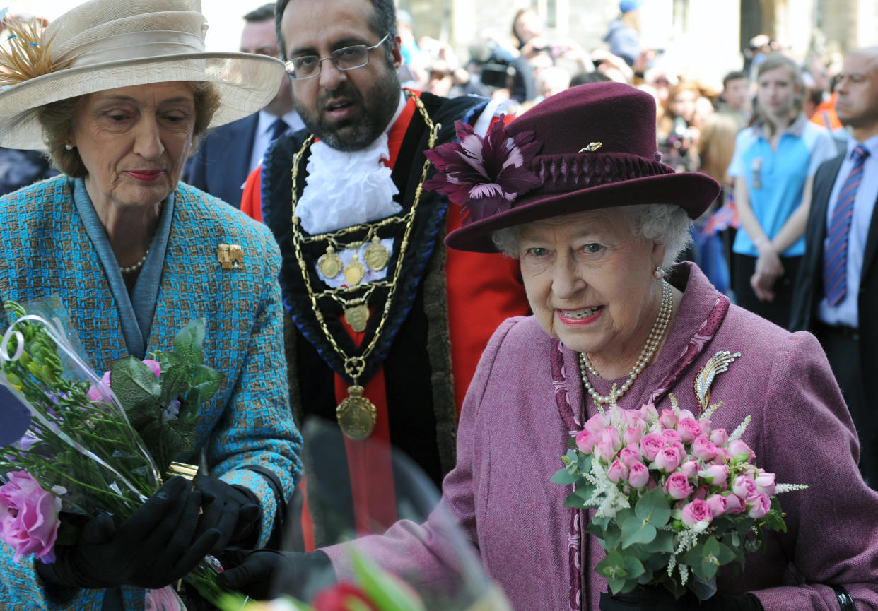 WINDSOR, UNITED KINGDOM - APRIL 30:  Queen Elizabeth ll, accompanied by her lady-in-waiting, Lady Susan Hussey undertakes a walkabout to mark her Diamond Jubilee on April 30, 2012 in Windsor, England. (Photo by Anwar Hussein/WireImage)