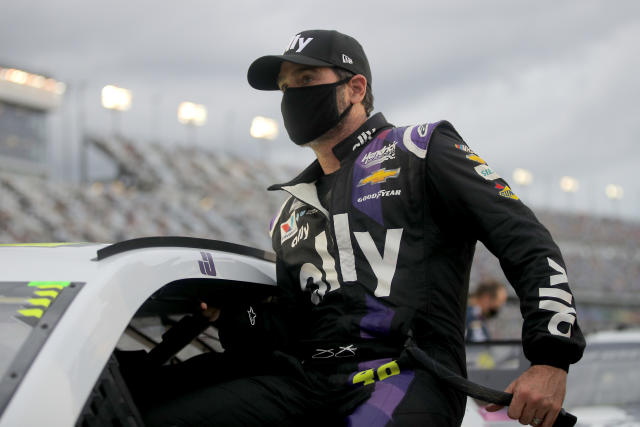 DAYTONA BEACH, FLORIDA - AUGUST 29: Jimmie Johnson, driver of the #48 Ally Chevrolet, climbs into his car prior to the NASCAR Cup Series Coke Zero Sugar 400 at Daytona International Speedway on August 29, 2020 in Daytona Beach, Florida. (Photo by Chris Graythen/Getty Images)