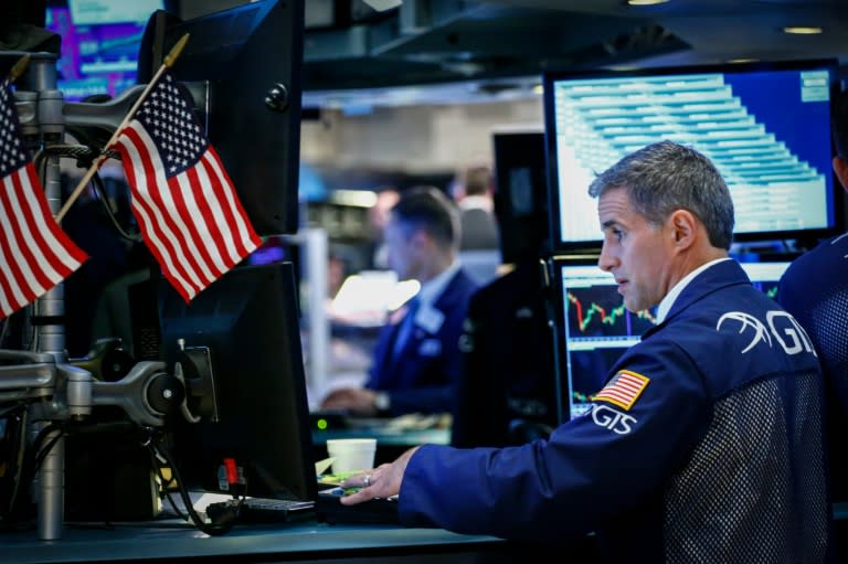 At the closing bell, the Dow Jones Industrial Average was at 18,612.32, up 0.6 percent